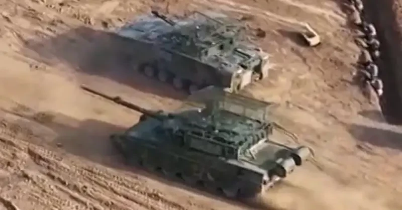 «Козырьки», дроны и дымовая завеса: НОАК учится прорывать укрепрайоны при противодействии БПЛА