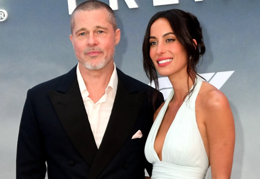 Брэд Питт с Инес де Рамон "в наряде невесты" появились на премьере фильма